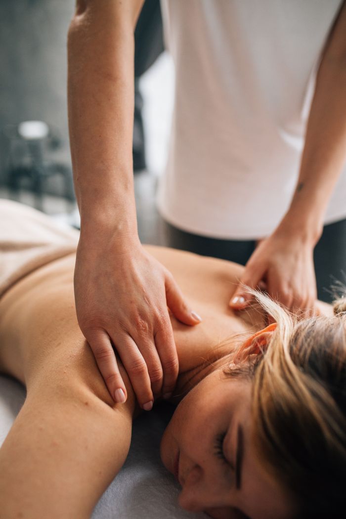 Home A soothing massage therapy session indoors, promoting relaxation and self-care.